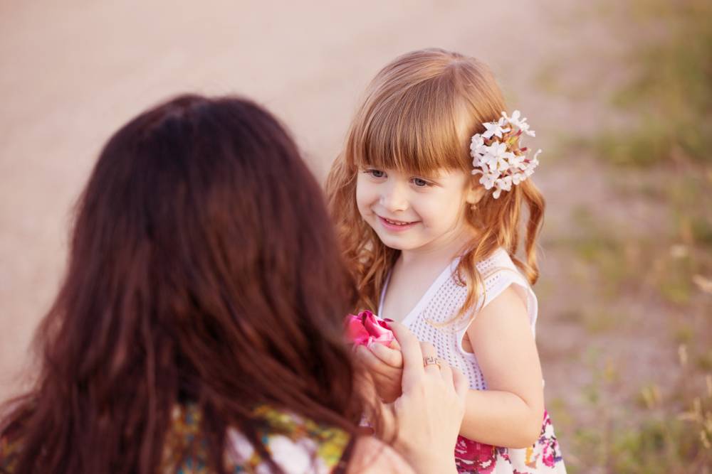 Portrait daughter and mom outdoor